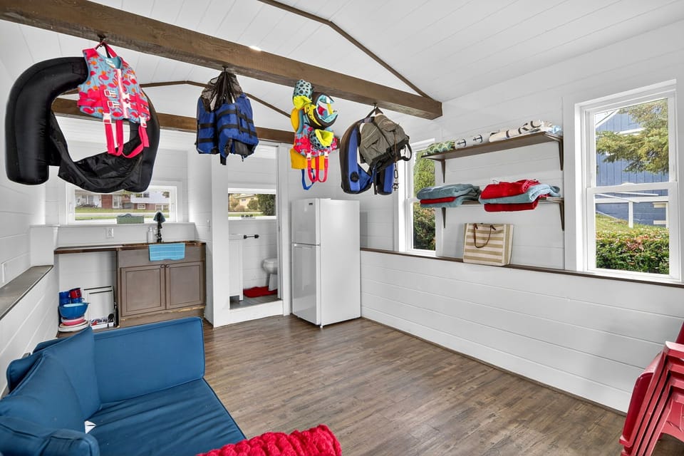 Your go-to spot for lake days—this handy lakeside chalet is stocked with life vests, towels, and seating, making it easy to gear up and head straight to the water.