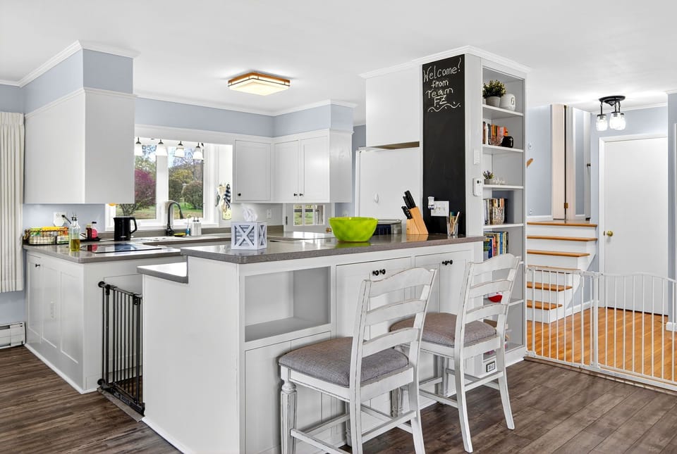 The heart of the home—an open kitchen with a spacious island, bar seating, and an easy flow that’s perfect for morning coffee or casual meals together.