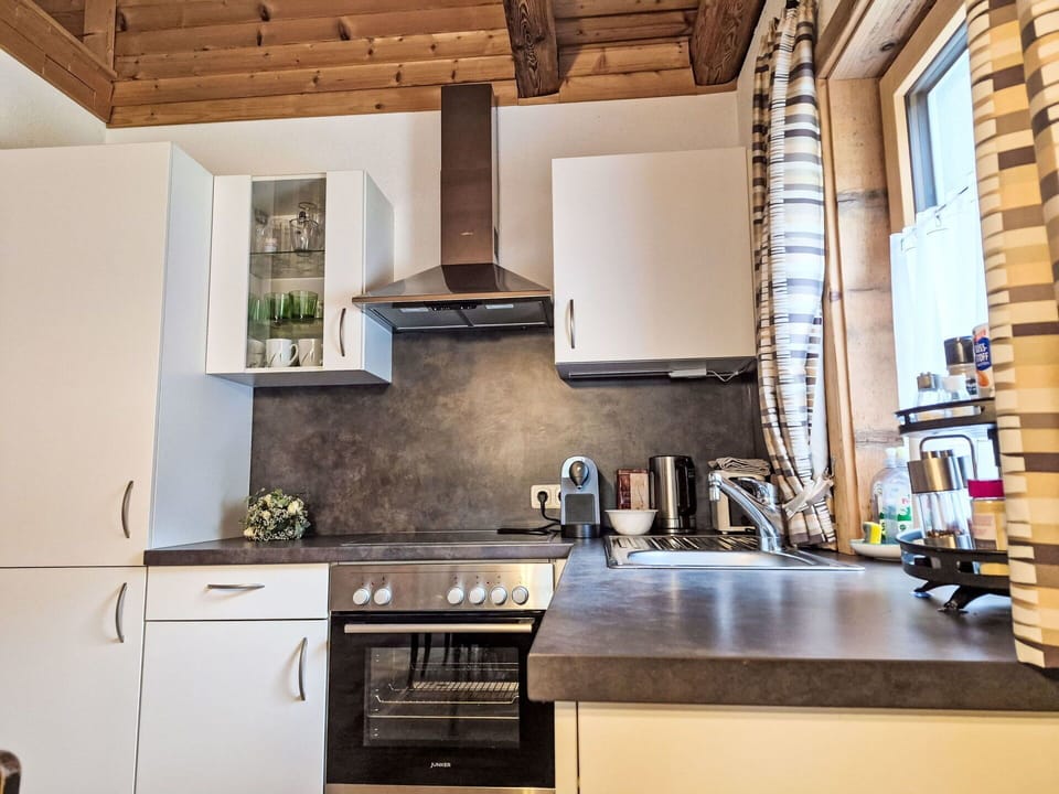 Kitchen, Kitchen Appliance, Countertop, Major Appliance, Furniture, Interior Design, Wood, Flooring, Cabinetry, Ceiling