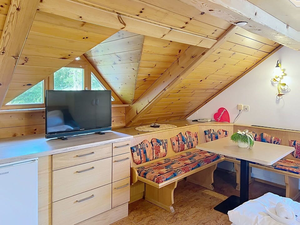 Wood, Interior Design, Furniture, Ceiling, Flooring, Floor, Room, Wood Stain, Chair, Living Room