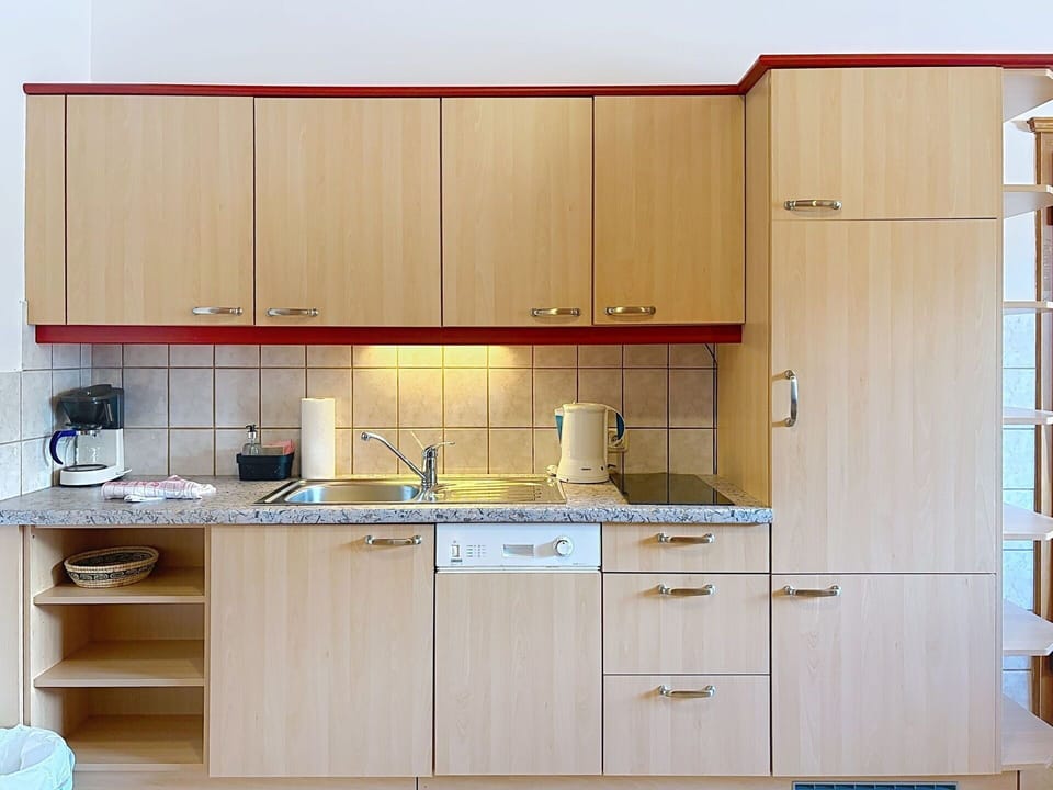 Wood, Kitchen, Cabinetry, Flooring, Interior Design, Furniture, Countertop, Cupboard, Kitchen Appliance, Floor