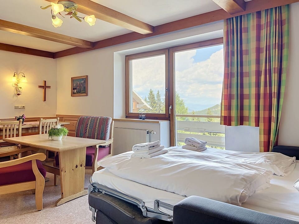 Furniture, Interior Design, Ceiling, Room, Chair, Picture Frame, Hotel, Kitchen & Dining Room Table, Hardwood, Houseplant