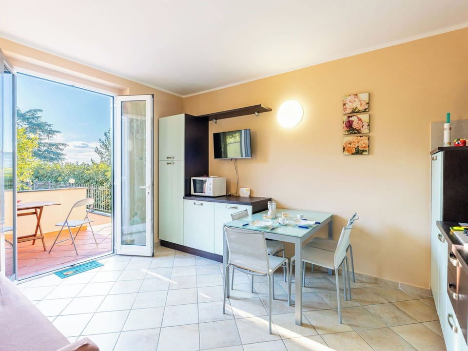 Furniture, Chair, Balcony, Wood Stain, Kitchen & Dining Room Table, Outdoor Furniture, Eco Hotel, Villa