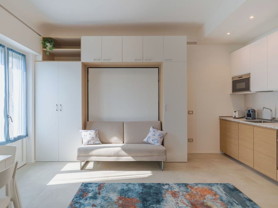 Furniture, Interior Design, Flooring, Wood, Floor, Couch, Living Room, Room, Lighting, Apartment