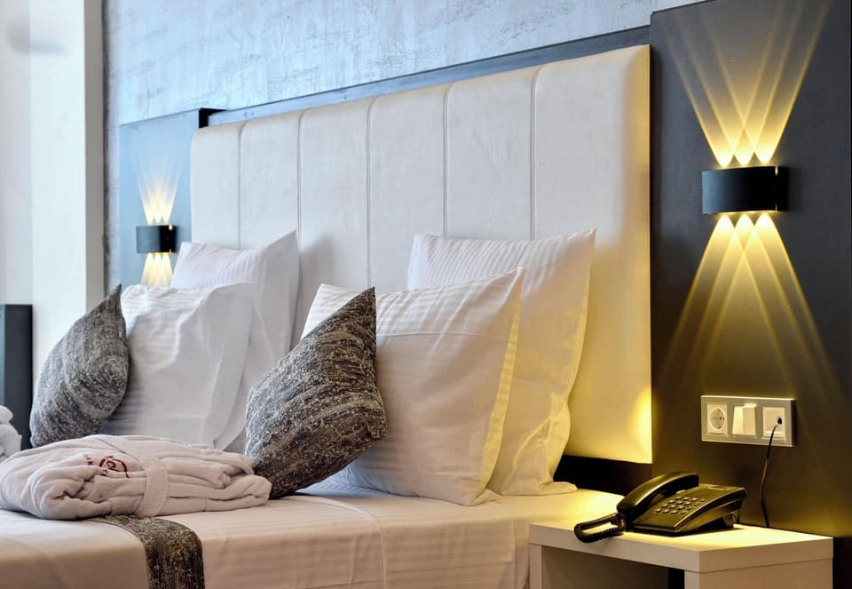 Standard Double or Twin Room | Minibar, in-room safe, desk, laptop workspace