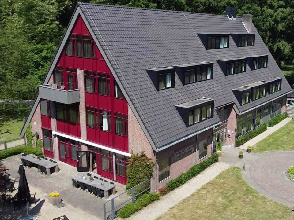 Explore a contemporary annex nestled beside peaceful woodland paths.