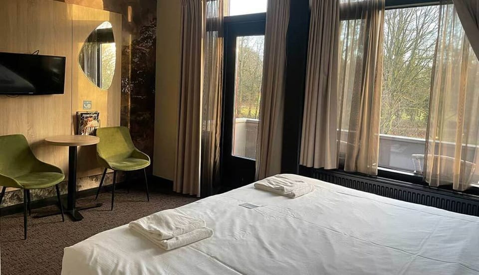 Wake up to forest views beside a cozy window nook