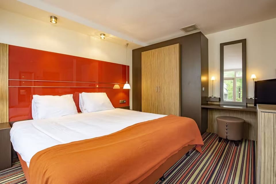 Sink into a cozy bed after a full day out.