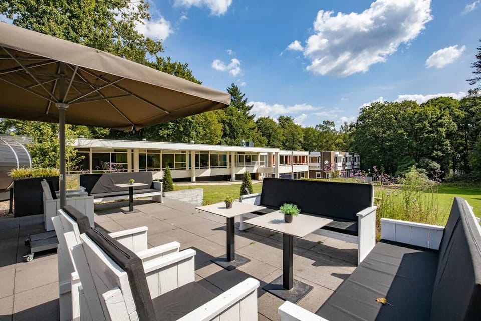 Sip cocktails on the rooftop-style terrace with open skies.
