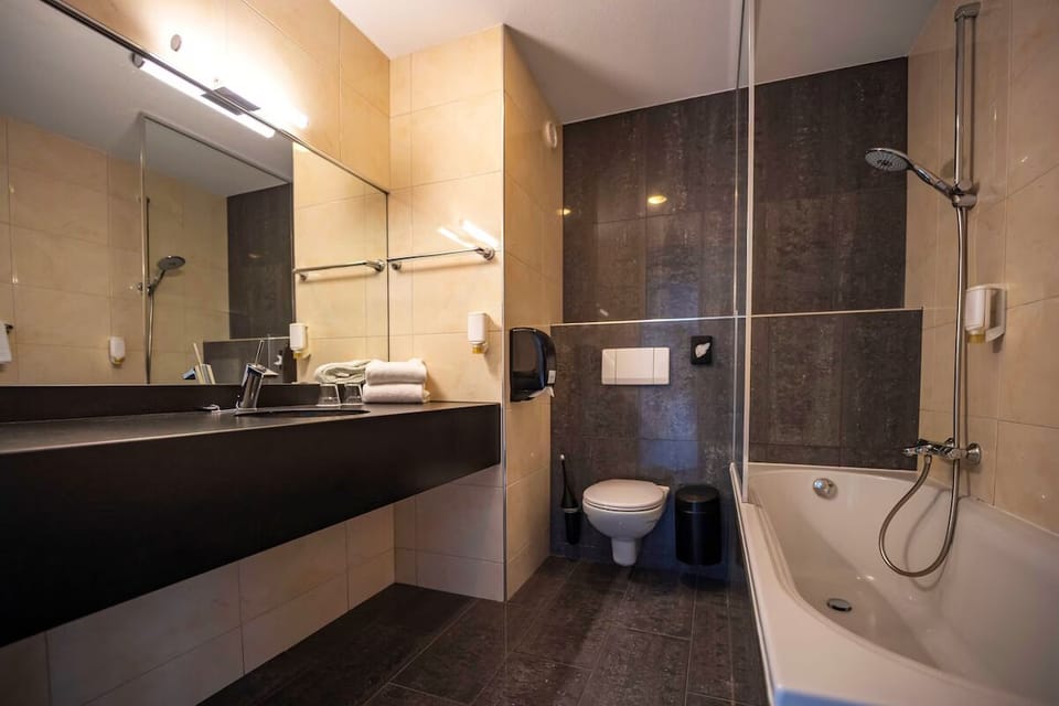 Rinse away the day in a bright, spa-like bathroom.