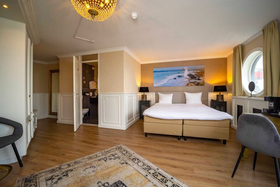 Wake up to ocean light beside a plush, restful bed.