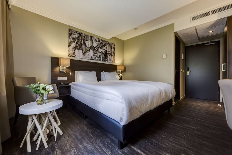 Settle in comfortably with soft linens and calming tones.