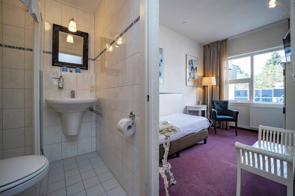 Step from bed to refreshed mornings with convenient en-suite layout.