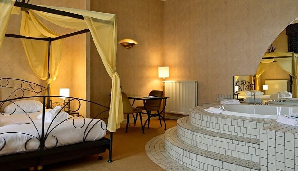 Relax together in a spacious suite with in-room jacuzzi.