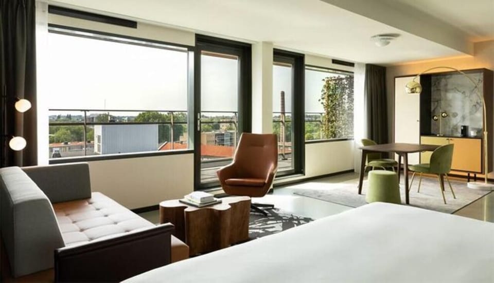 Wake up to panoramic views from a sunlit, spacious king bed.