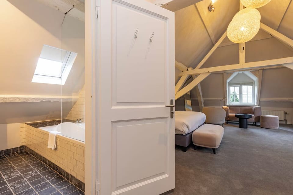 Refresh easily with the bathroom just steps from bed.