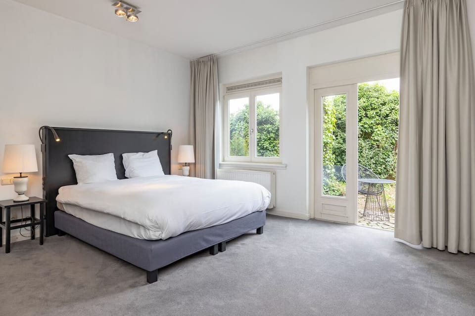Wake up to garden views and soft, restful bedding.
