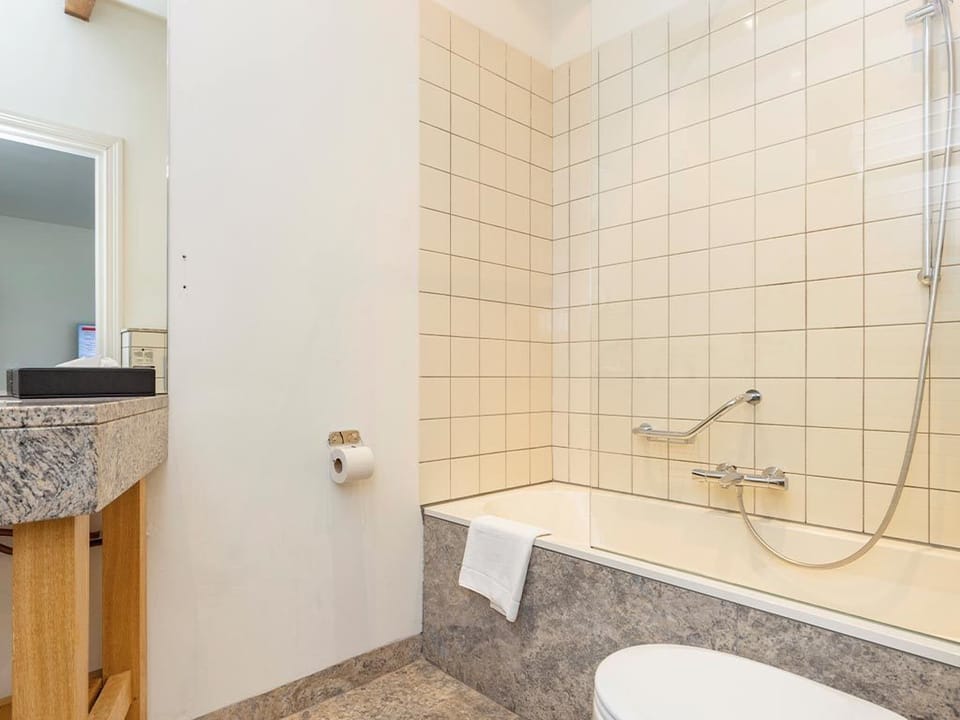Soak and reset with a deep tub and refreshing shower.