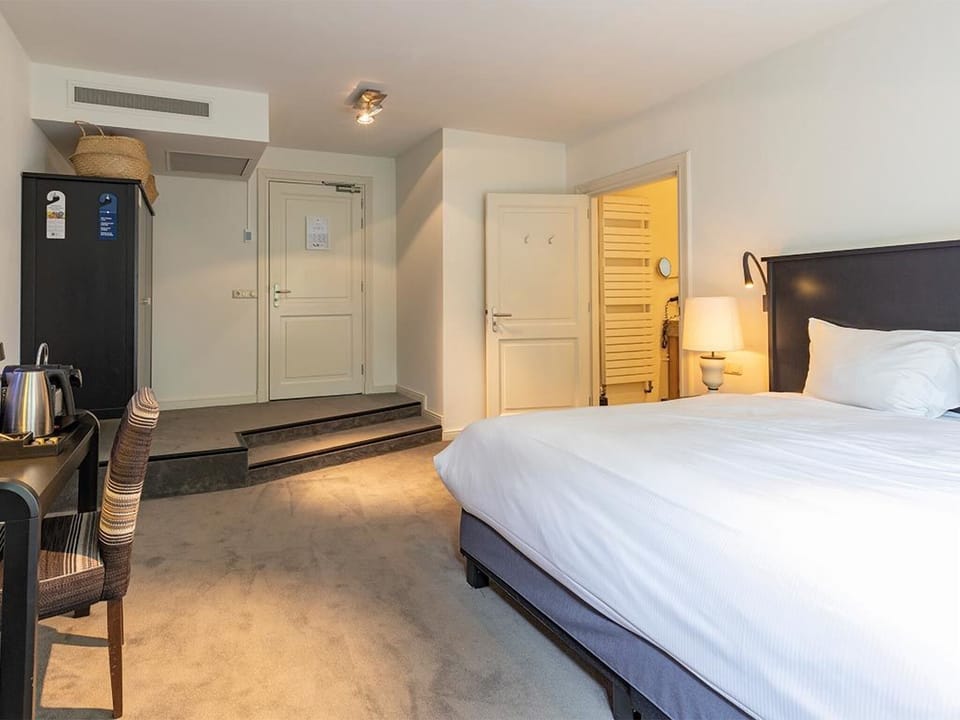 Settle in comfortably with an open layout and warm lighting.