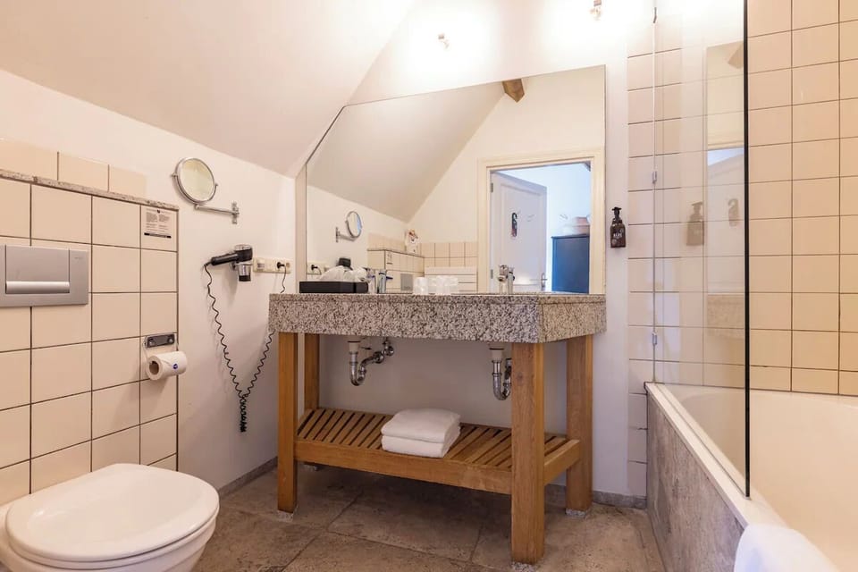 Refresh in a spotless bath with generous vanity space.