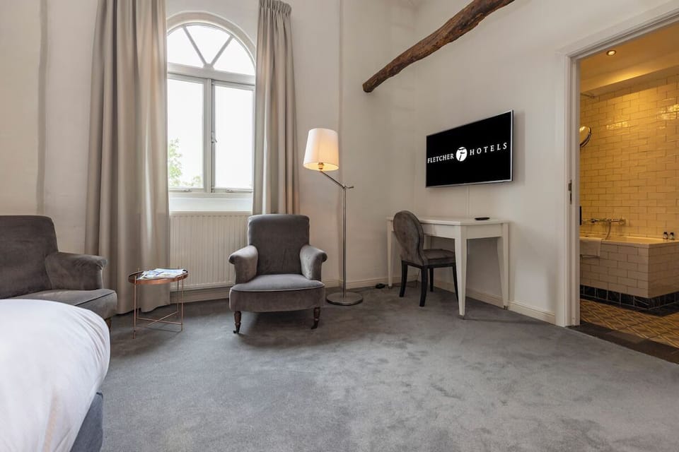 Enjoy cozy nights with arched-window ambiance and TV-ready comfort.
