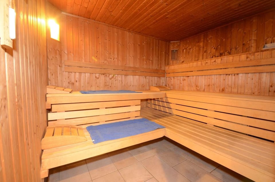 Recharge in the warm wood sauna after a day outdoors.