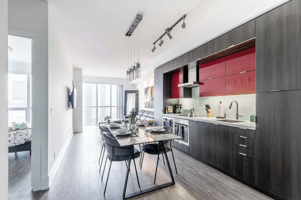 Business Apartment, City View | Living area | 65-inch Smart TV with digital channels