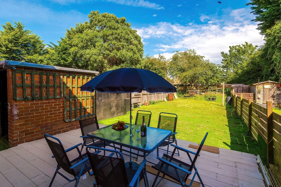 Private fully fenced rear garden and patio