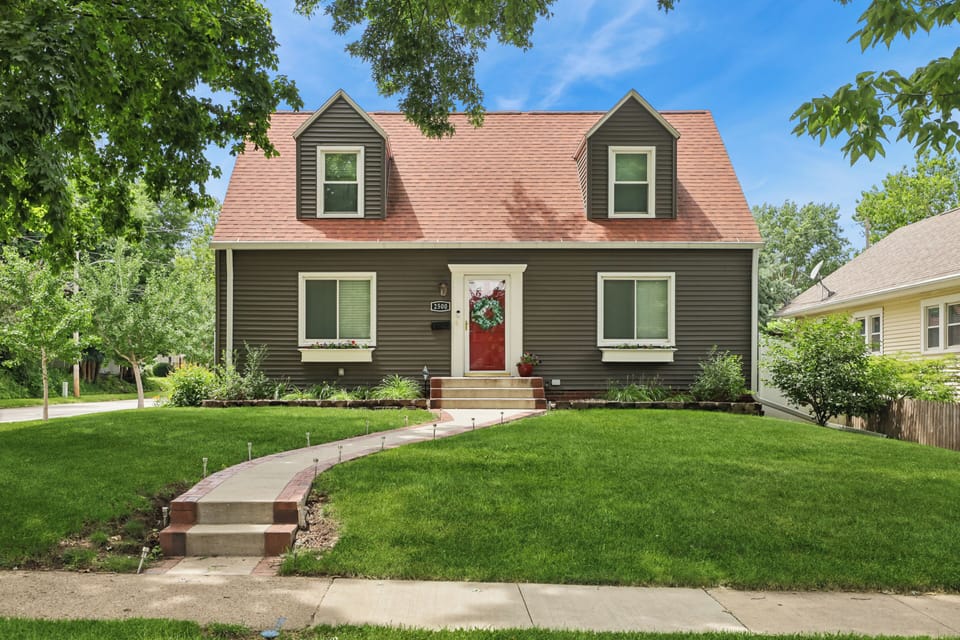 Red Door Retreat - our signature red door and big lawn in charming Beaverdale.  