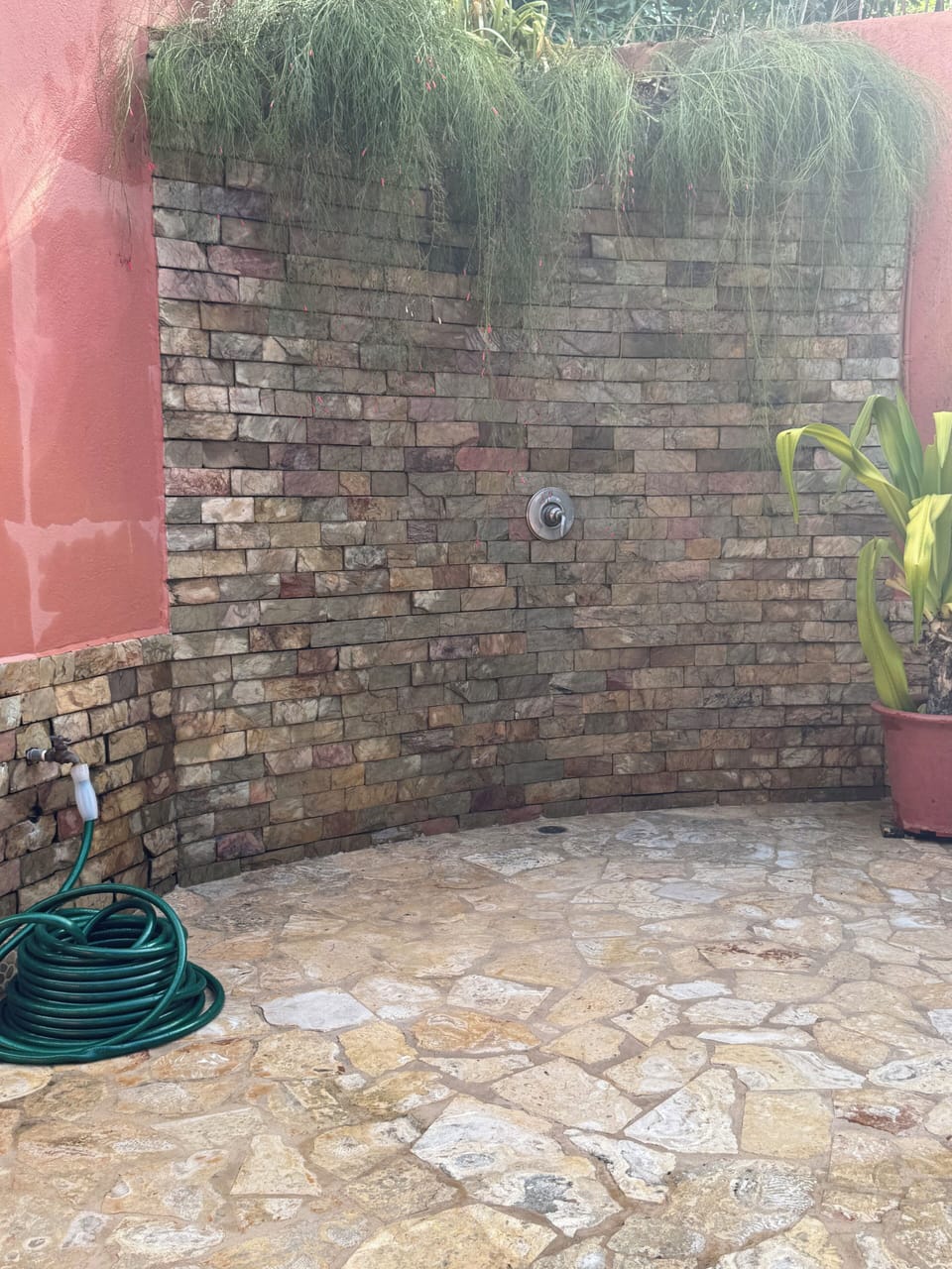 Outdoor shower by pool