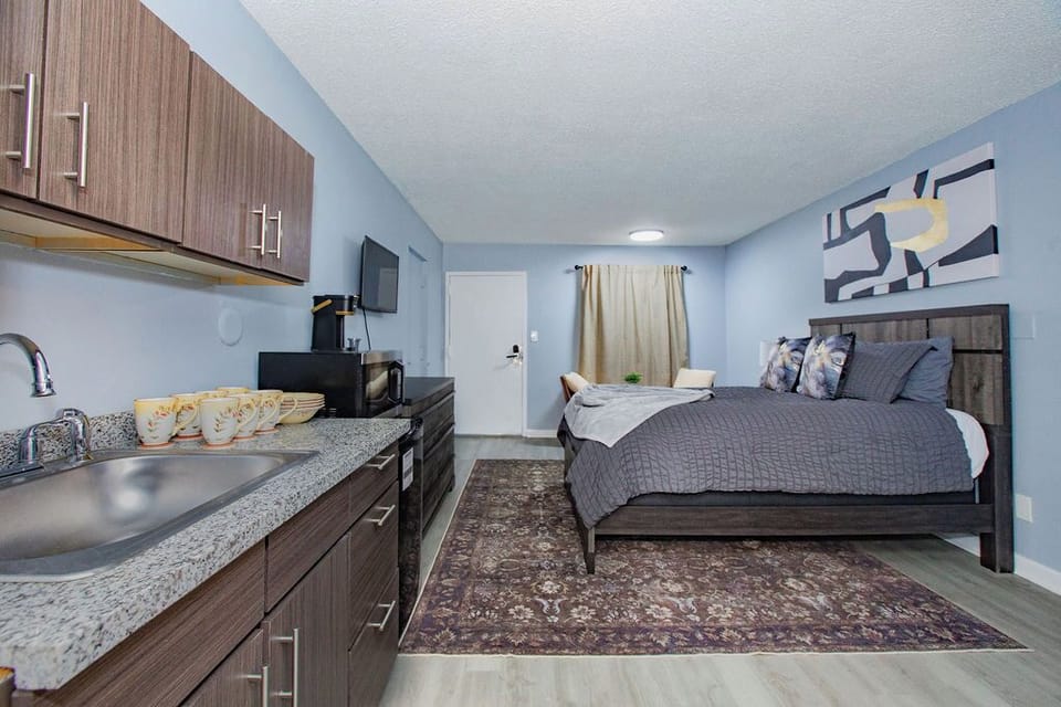 Kitchenette with an Air Fryer, Microwave and dining set