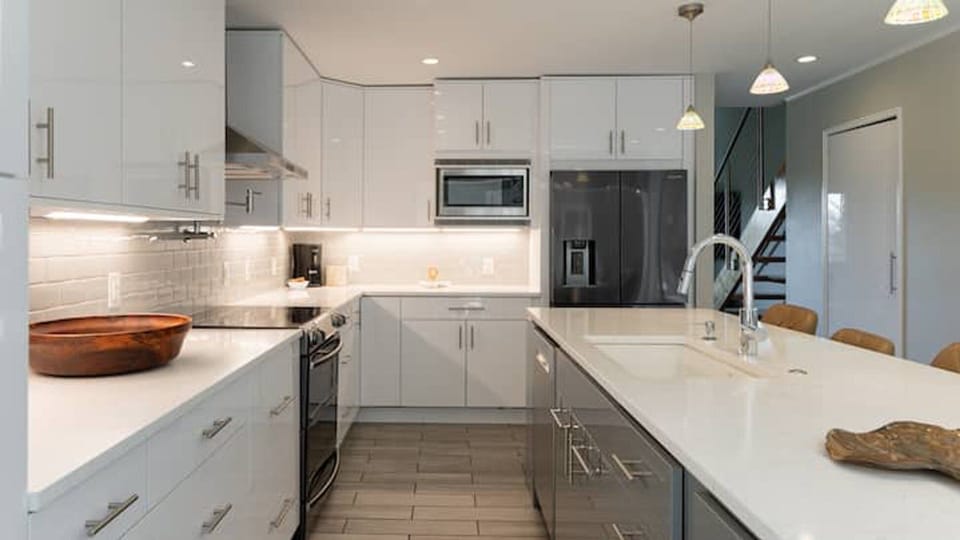Kitchen is outfitted with an electric range