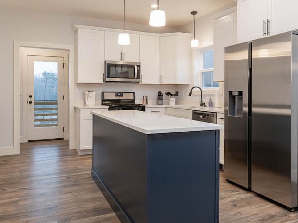 Screened Porch is accessed from Kitchen