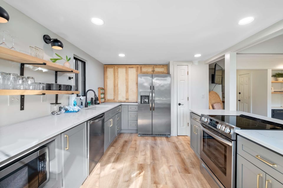 Another view of the fully equipped kitchen from the dining room.