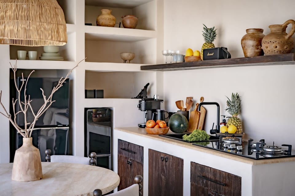 Fridge, stovetop, electric kettle, cookware/dishes/utensils