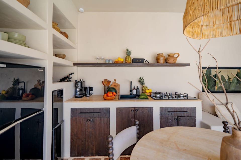 Fridge, stovetop, electric kettle, cookware/dishes/utensils