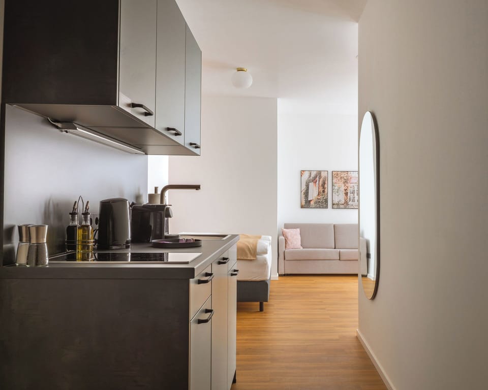 Family Suite with Sofa Bed | Private kitchen | Espresso maker, electric kettle