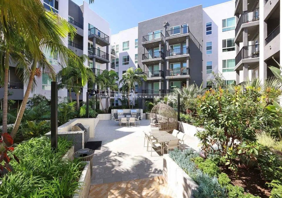Community courtyards featuring outdoor seating and inviting gathering space