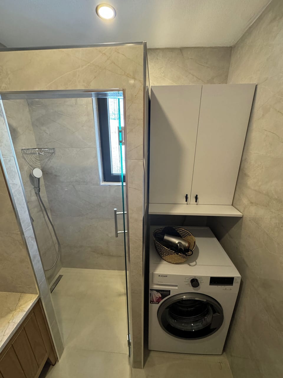 Shower, eco-friendly toiletries, hair dryer, towels