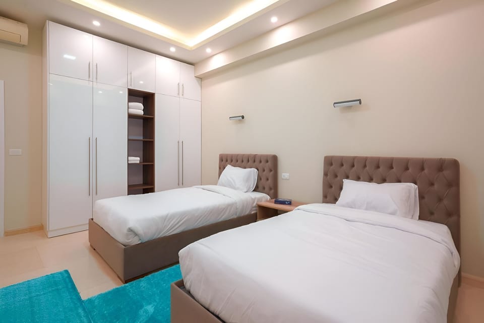 Deluxe Double or Twin Room, Balcony | Desk, laptop workspace, iron/ironing board