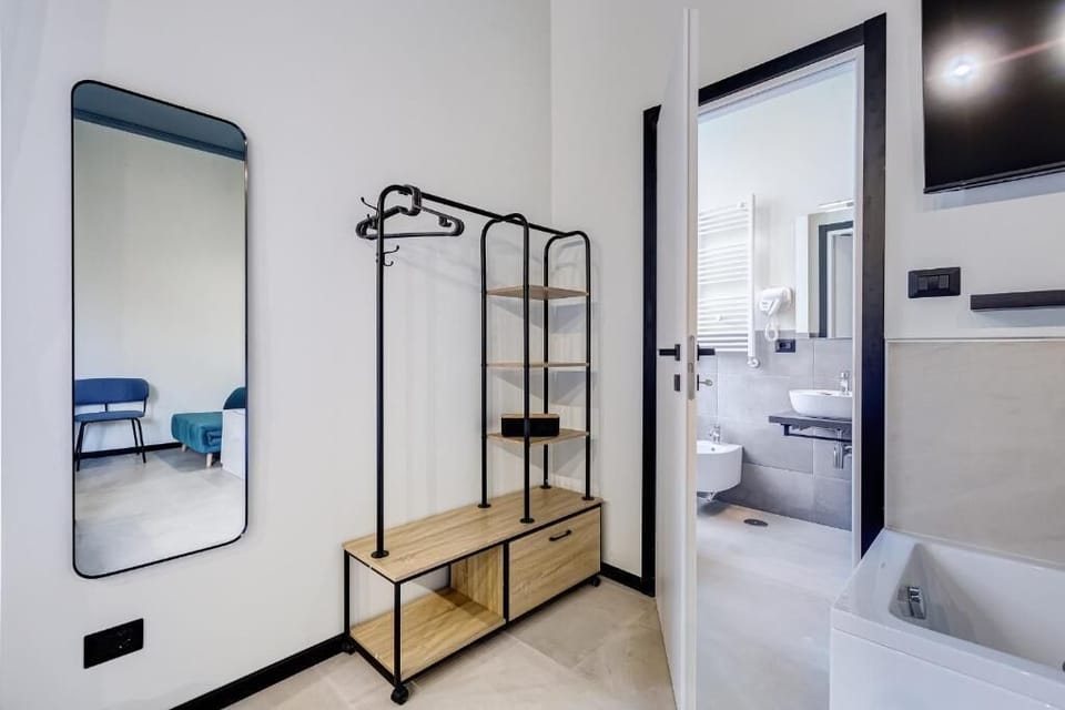 Family Triple Room | Bathroom | Shower, free toiletries, hair dryer, bidet