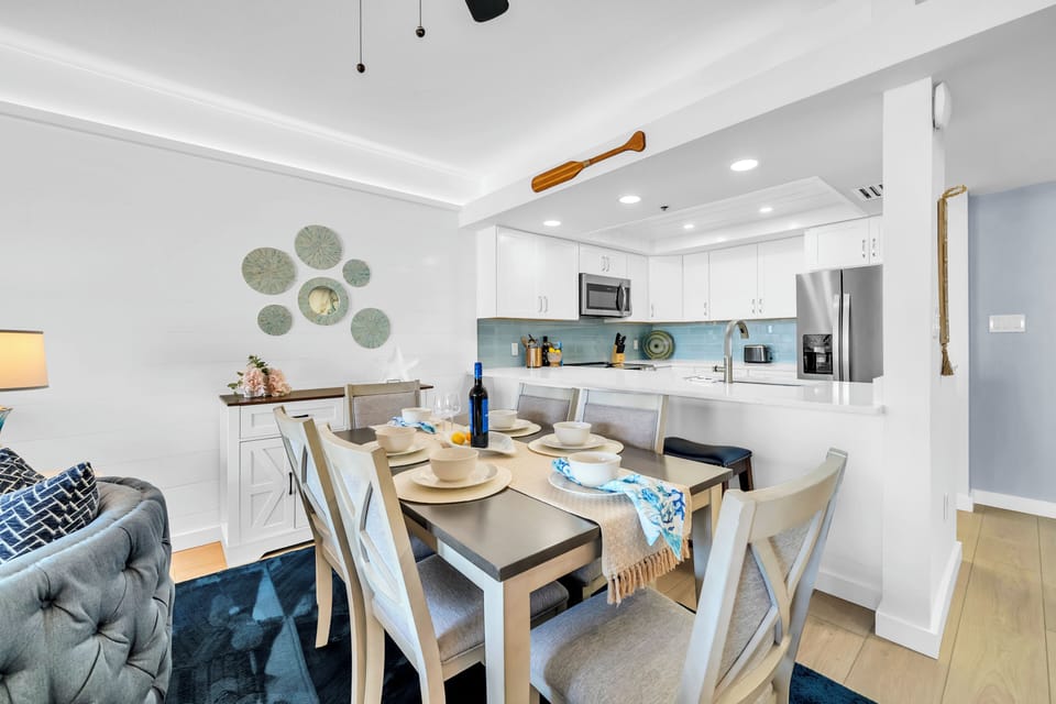 Your open-concept space flows beautifully from dining to kitchen, perfect for sharing meals and making memories together.