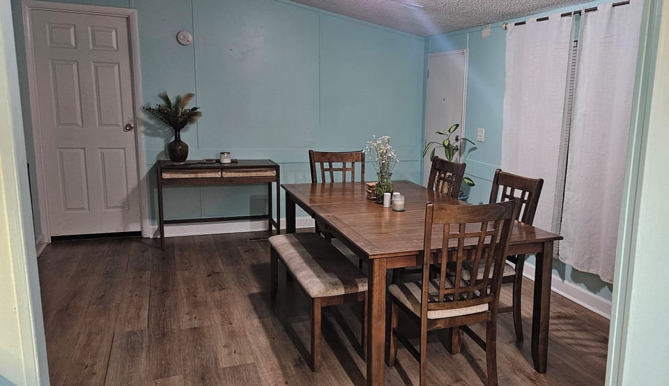 This is the dining room, connected to the living room - open concept style.