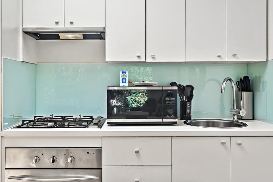 Apartment | Private kitchen | Cleaning supplies