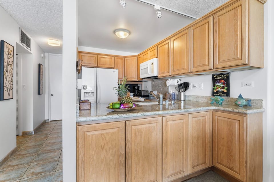Condo, Multiple Beds, Kitchen, Ocean View (Kona Alii 504) | Private kitchen | Coffee/tea maker