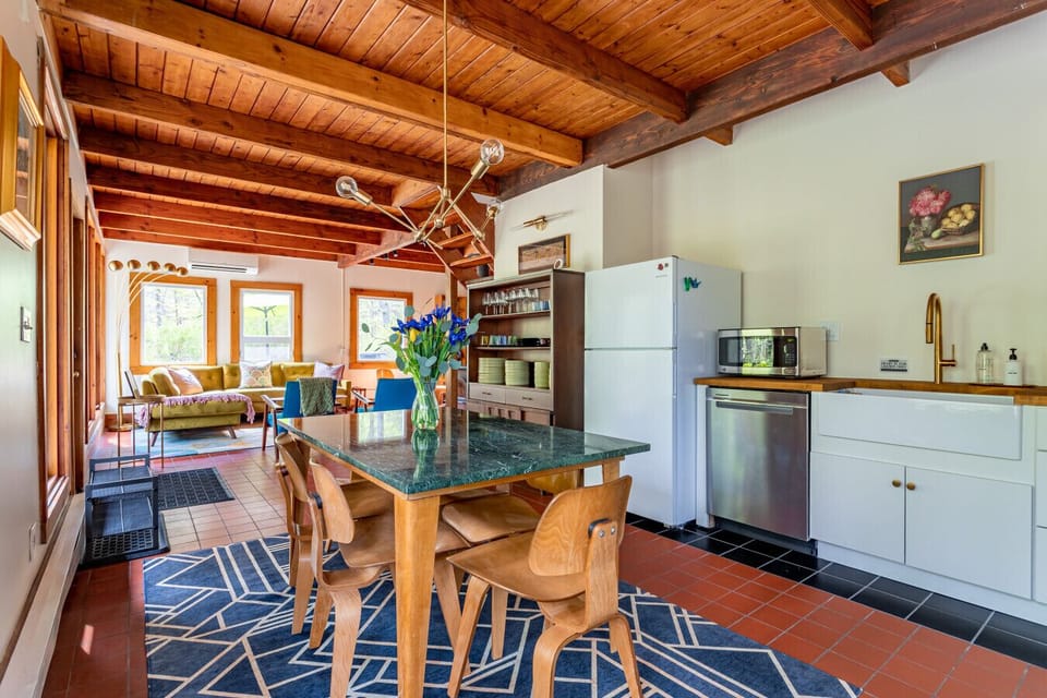 Light-filled open kitchen and dining area - perfect for gathering and cooking