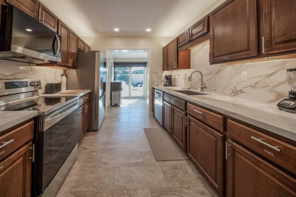 Gorgeous fully stocked Kitchen with Stainless Appliances