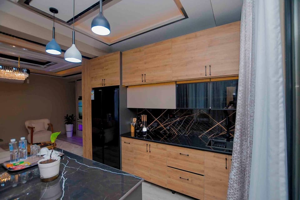 Executive Apartment, 1 Bedroom, Garden View | Private kitchen | Fridge, microwave, oven, stovetop