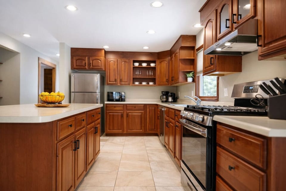 A spacious kitchen equipped with a propane gas stove, ready for everything from pancake mornings to gourmet nights.