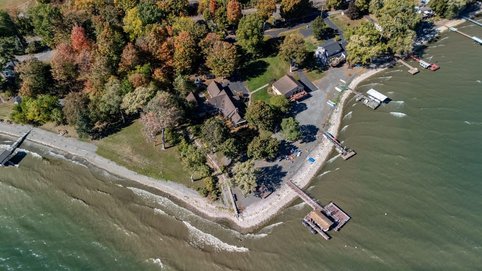 Expansive shoreline property with a private dock and unbeatable lake views. The ideal home base for boating, fishing, and relaxation.